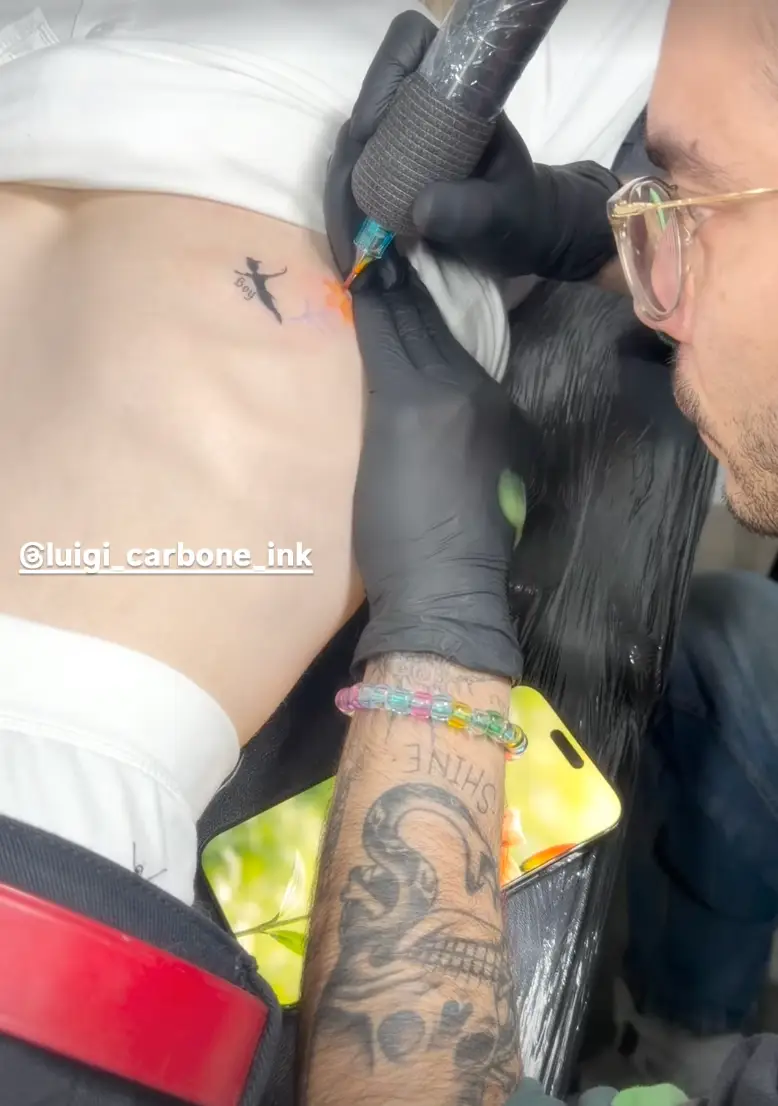 The reality TV star shared a video of her getting a new ribcage tattoo (Instagram/@kellyosbourne)