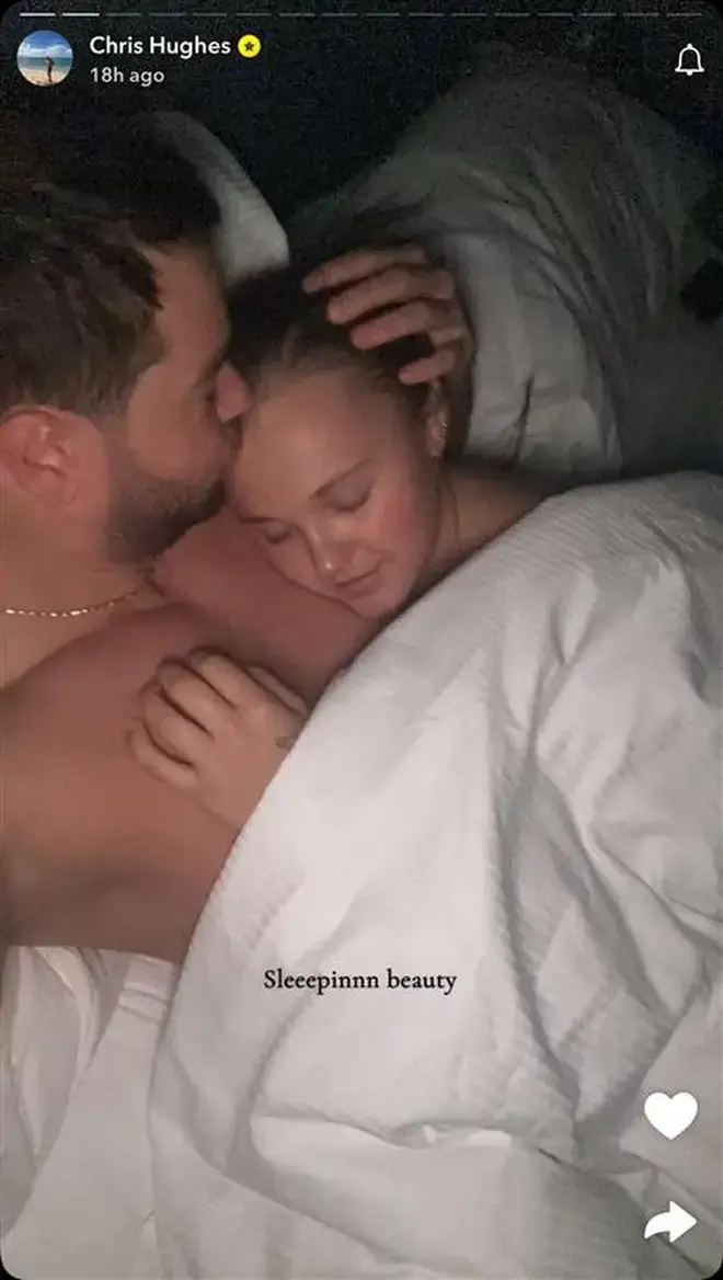 Hughes shared a snap of him and JoJo in bed together (Snapchat/Chris Hughes)
