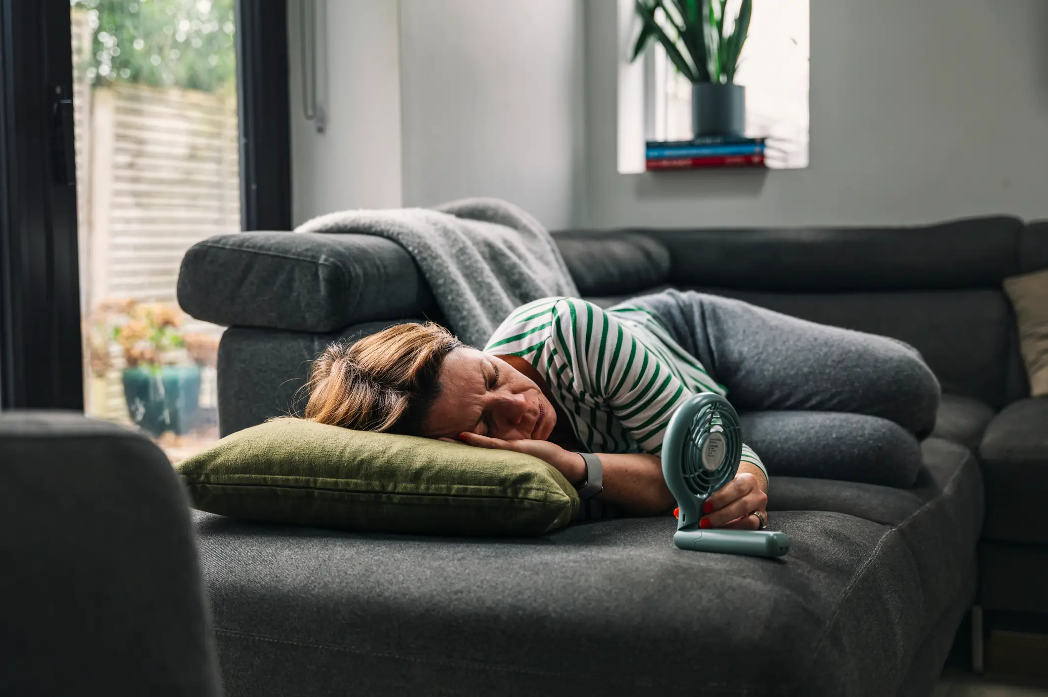 The most common menopause symptoms include changes to periods, hot flushes, and night sweats (Getty Stock Image)