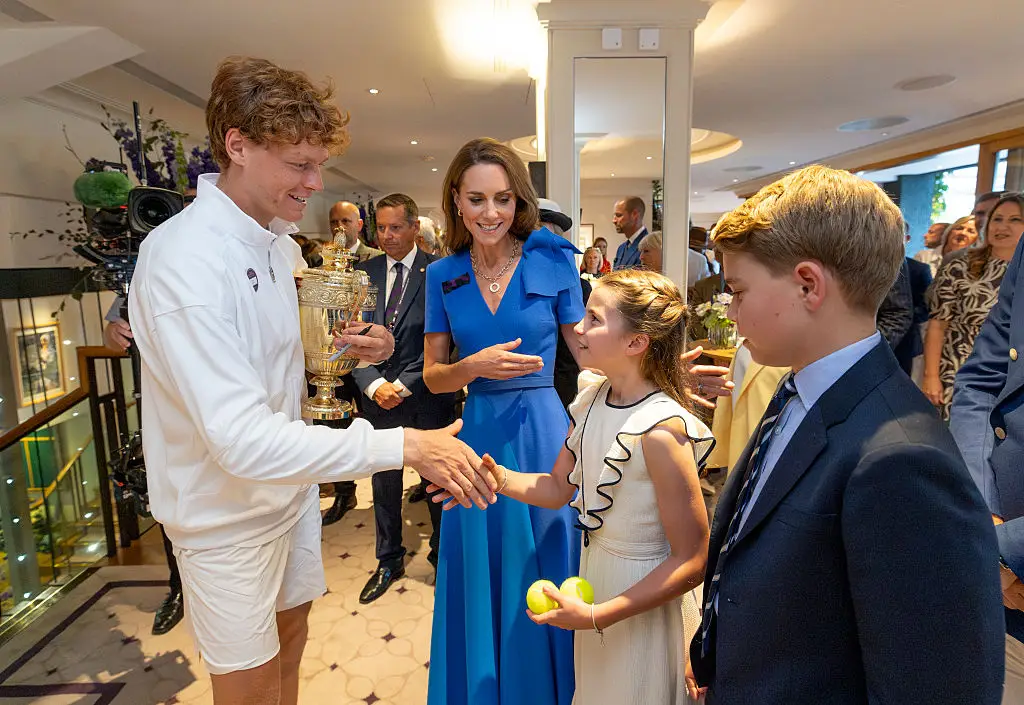 Jannik signed tennis balls for the children (Andrew Parsons/AELTC via Getty Images)
