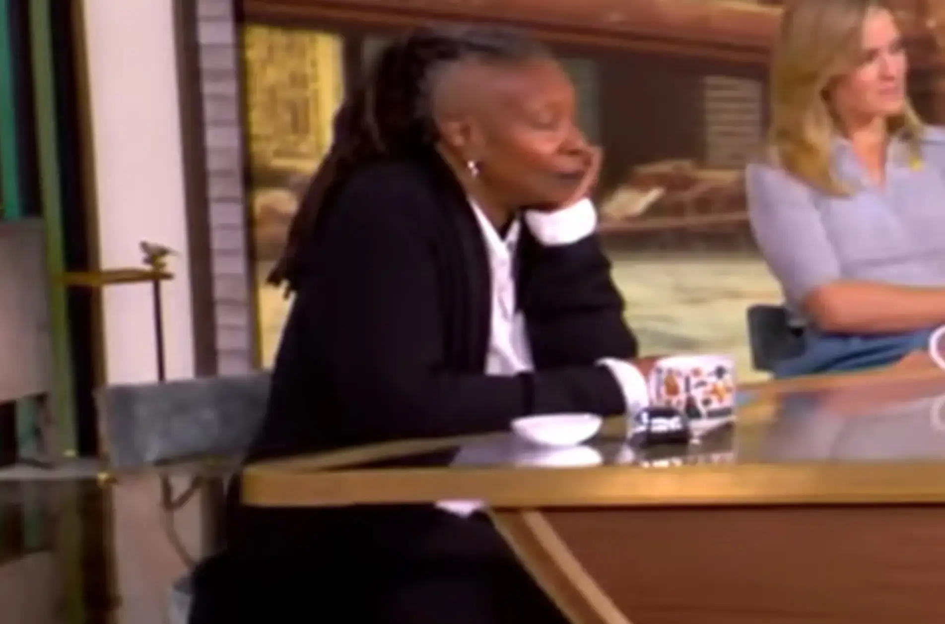 Goldberg appeared to have her eyes closed (The View)