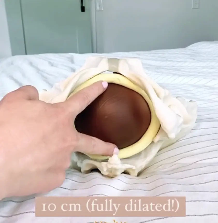 The video also showed how much the cervix has to dilate to be 'fully dilated'. (