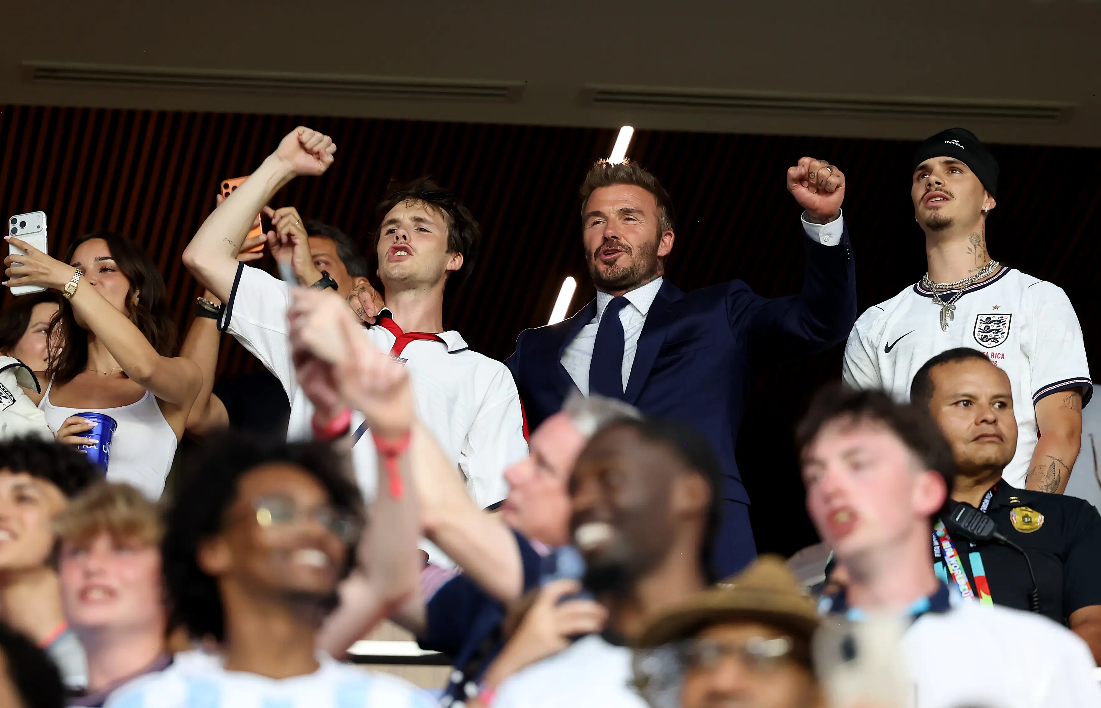 David was seen cheering alongside sons Romeo and Cruz (Ira L. Black - FIFA/FIFA via Getty Images)