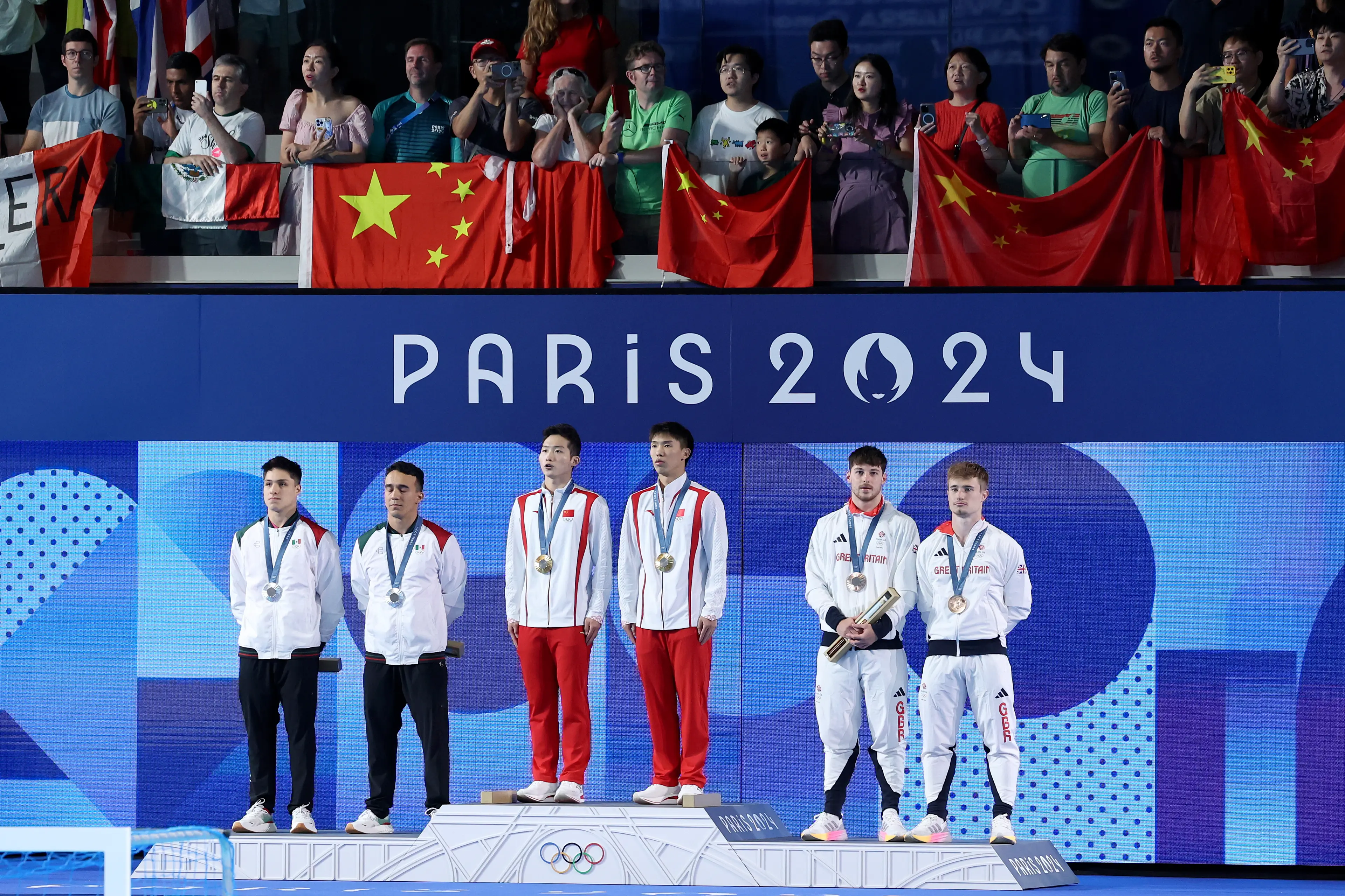 One Olympian has been forced to make money in other ways. (Quinn Rooney/Getty Images)