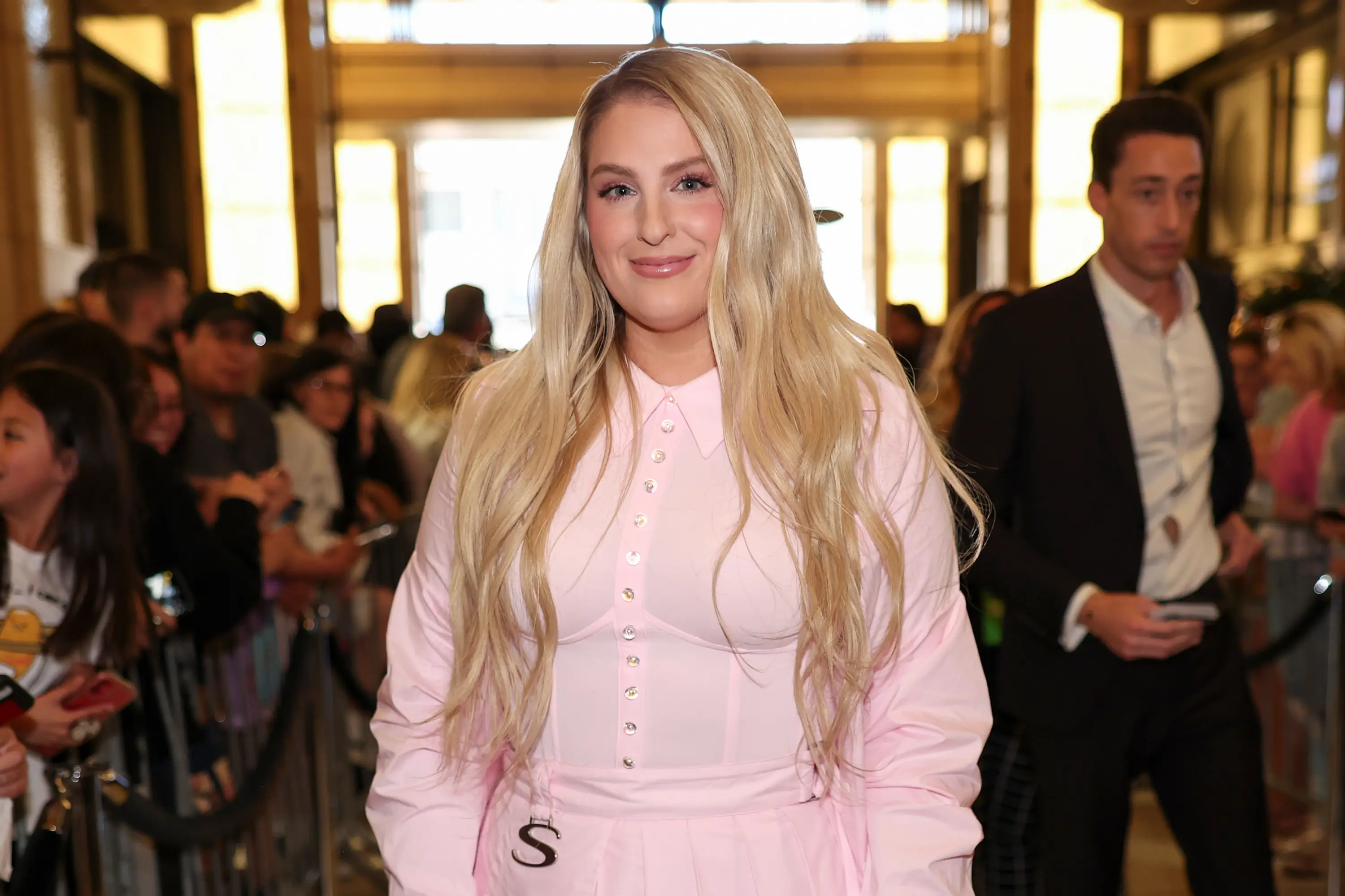 Meghan before her weight loss transformation (MICHAEL TRAN/AFP via Getty Image)