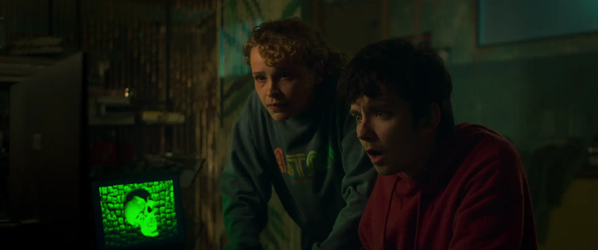 Iola Evans and Asa Butterfield in Choose or Die.