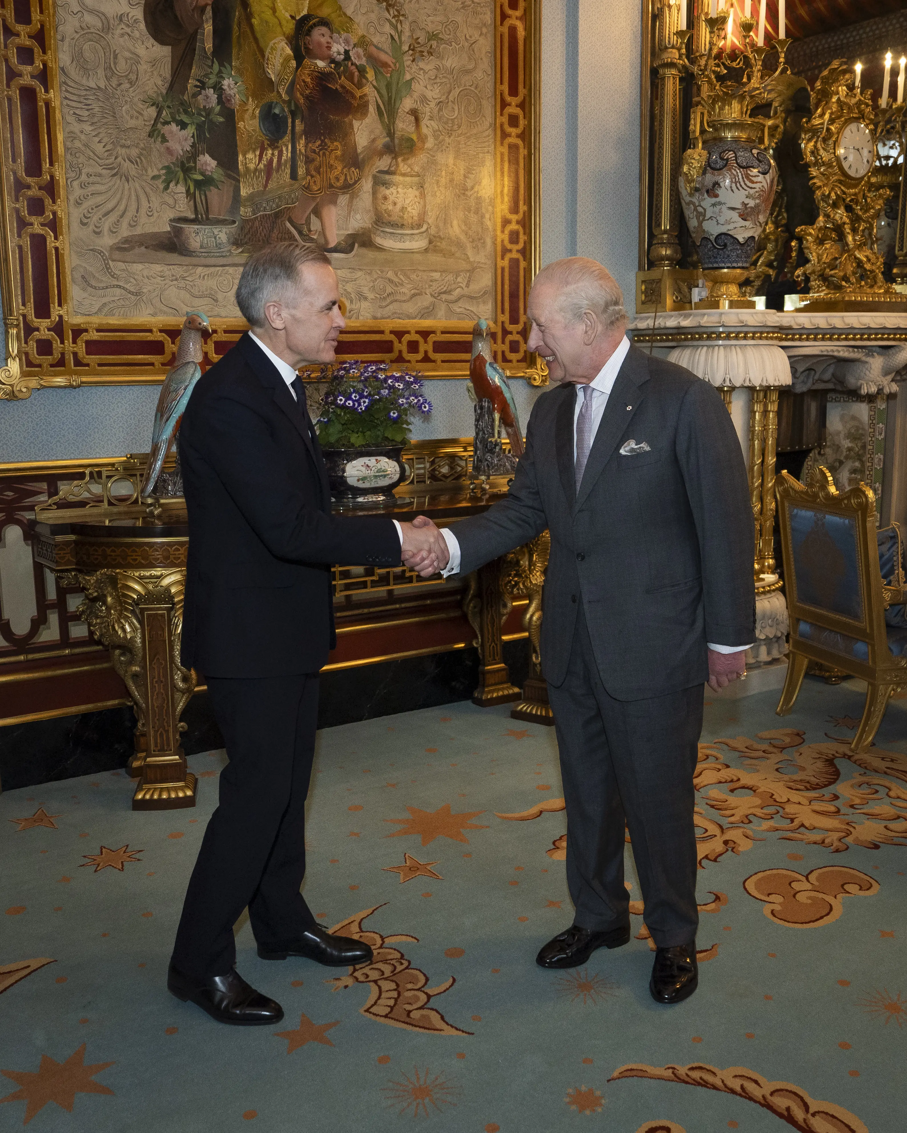 The parrot appeared to be hanging off Carney's shoulder (Aaron Chown - Pool / Getty Images)