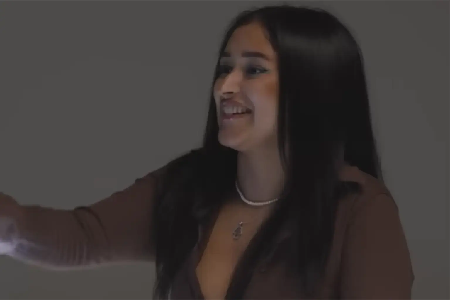 Maria also reached for the button, but was too slow.