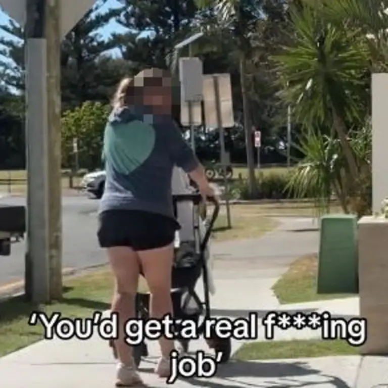 A woman fired a lethal middle finger at a group of influencers as they were taking selfies on the street.