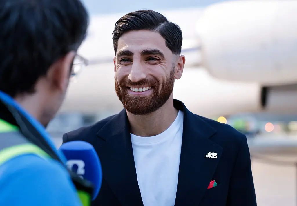 Iran’s World Cup football team wore '#168' pins honouring children killed in a February 28th missile strike on a Minab elementary school (Mario Tama / Staff / Getty Images)