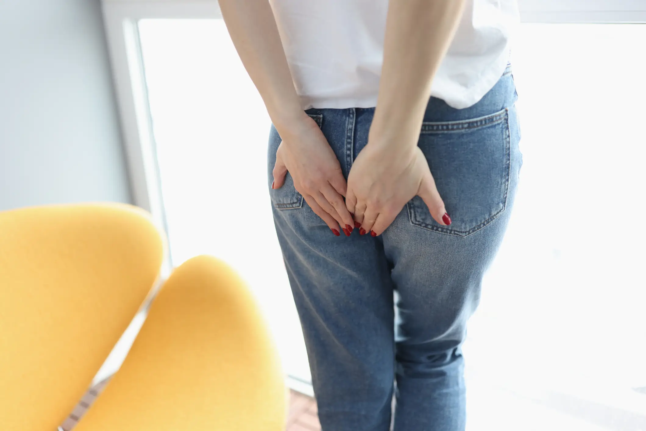 Have you experienced the sharp bum pain during your period? (Getty Stock Photo)