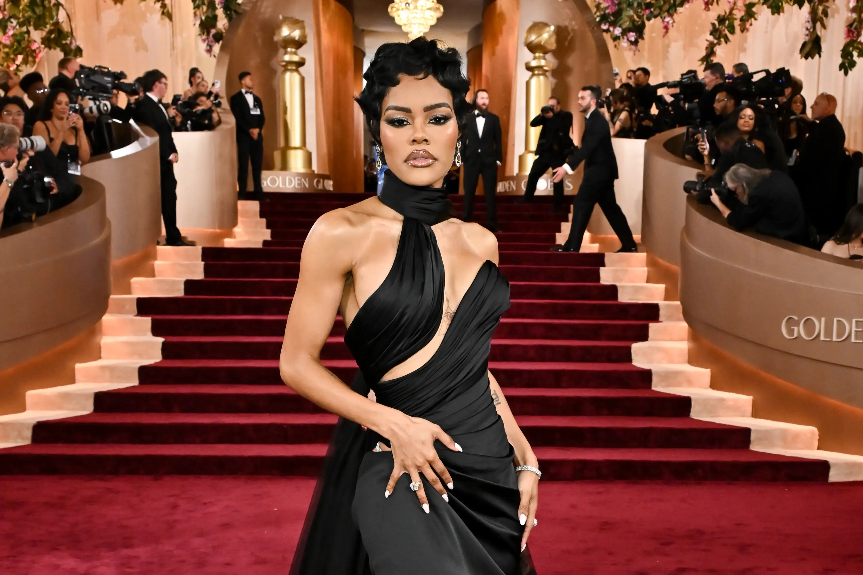 Teyana Taylor also wore all-black for her award-winning night (Michael Buckner/2026GG/Penske Media via Getty Images)