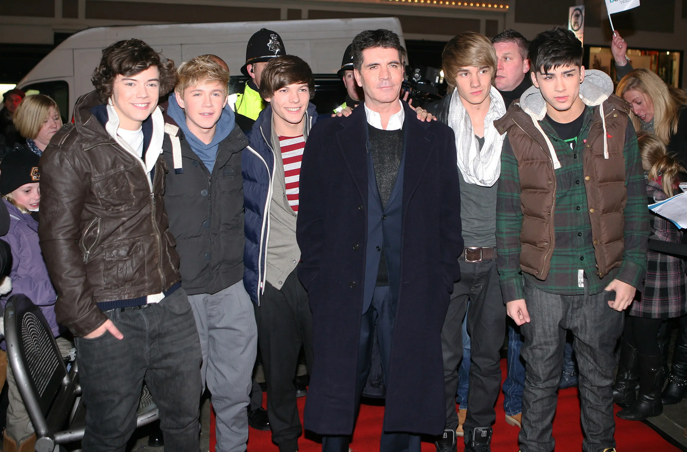 Simon Cowell with One Direction (Tony Woolliscroft/Contributor)