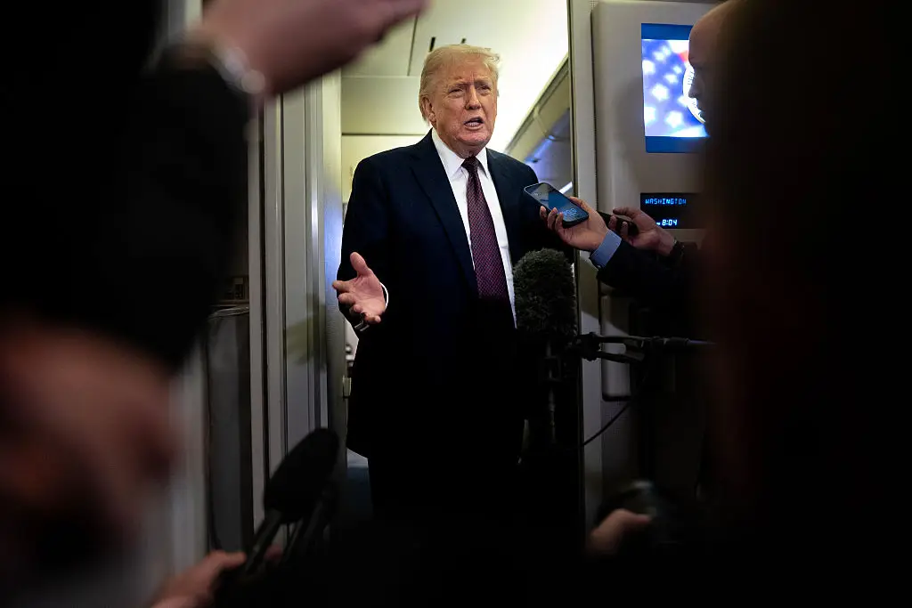 Trump also spoke to reporters on Air Force One on Sunday (Nathan Howard / Stringer / Getty Images)
