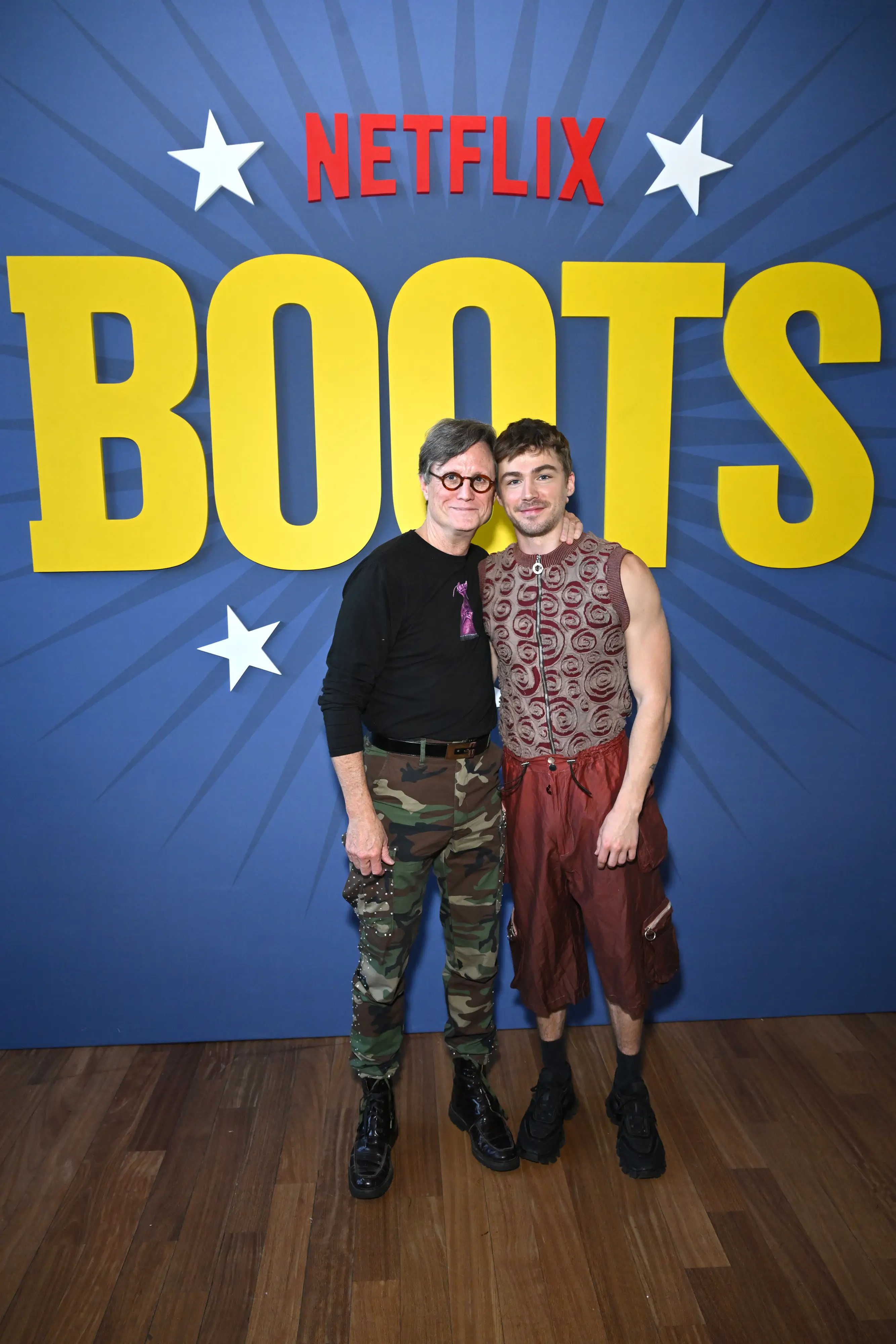 Greg Cope White with lead actor Miles Heizer (Bryan Bedder/Getty Images for Netflix)