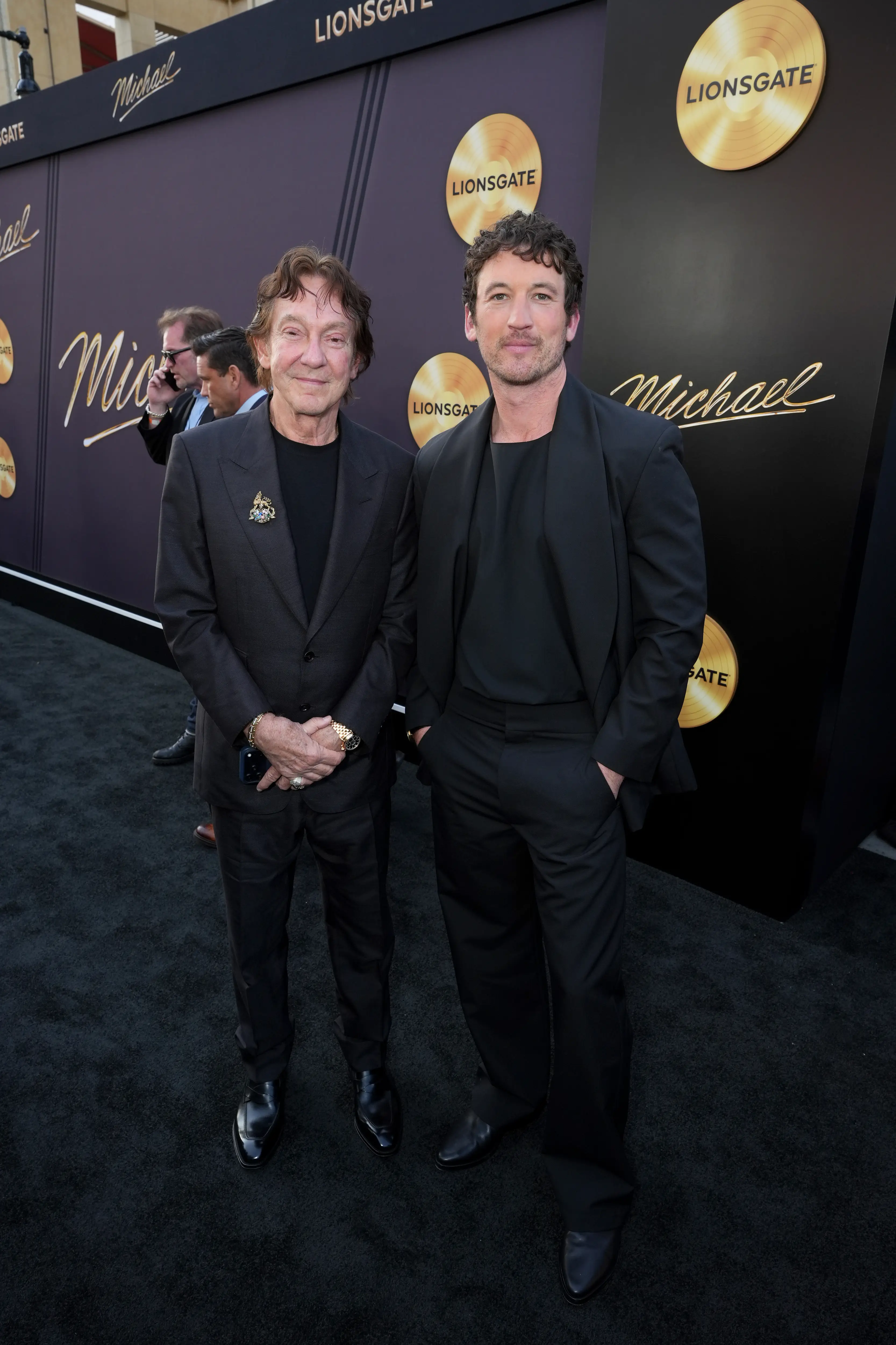 John Branca (left) was portrayed by Miles Teller in the new Michael biopic (Gonzalo Marroquin/Getty Images for Lionsgate)