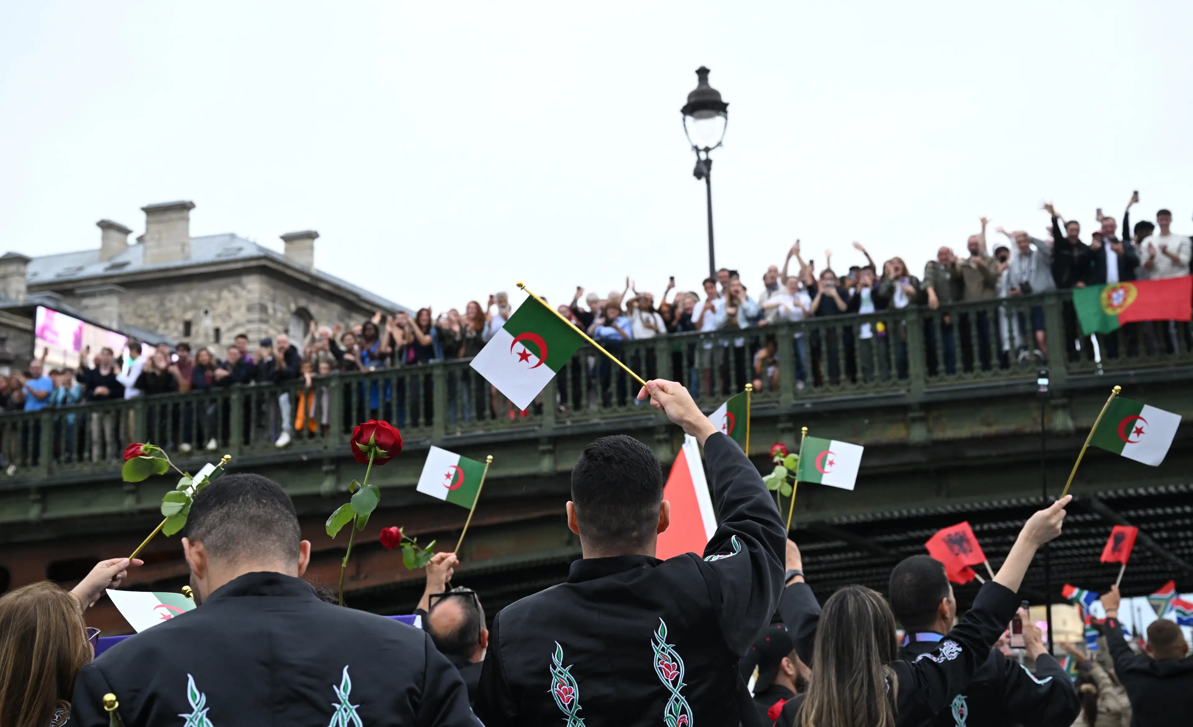 They threw the roses into the river. (Annegret Hilse-Pool/Getty Images)