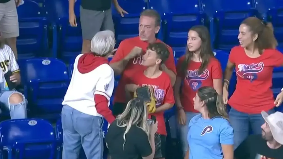 A woman demanded the ball from a father and son at a Phillies game (ESPN)