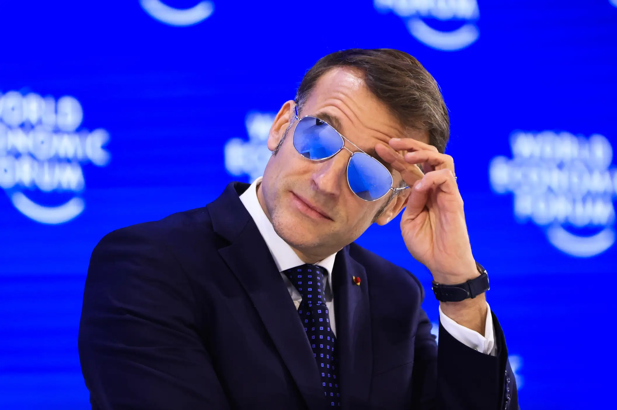 French President Emmanuel Macron donned a pair of sunglasses at the World Economic Forum in Davos today (Krisztian Bocsi/Bloomberg via Getty Images)