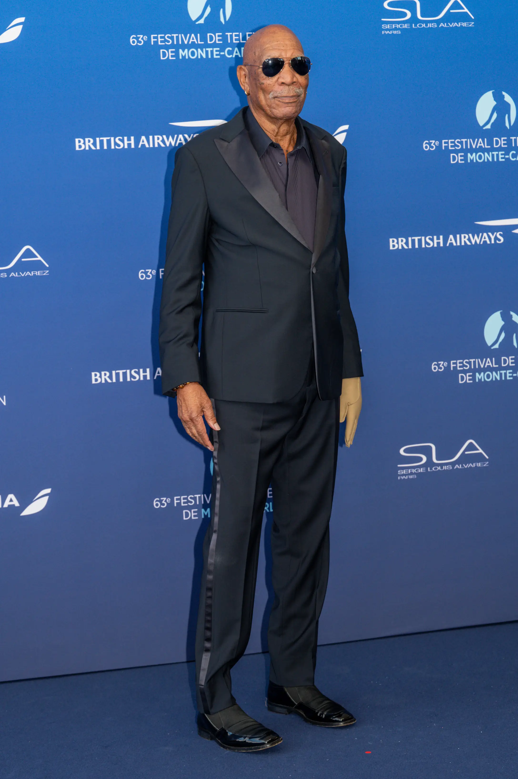 Morgan Freeman wears a compression glove due to sustaining injuries in 2008. (Stephane (Cardinale - Corbis/Corbis via Getty Images)