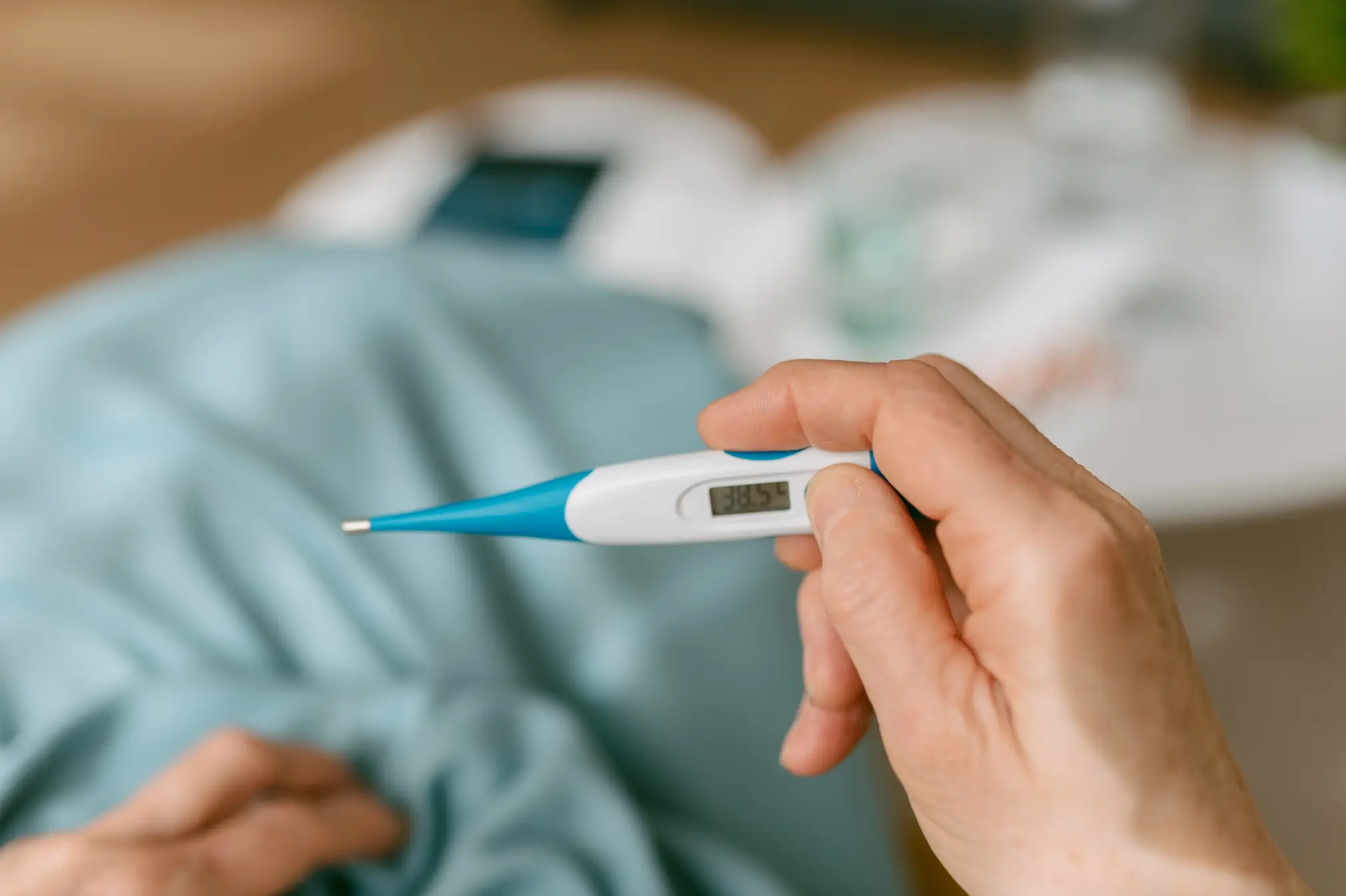 A high temperature can be a symptom of norovirus (Getty Stock Images)