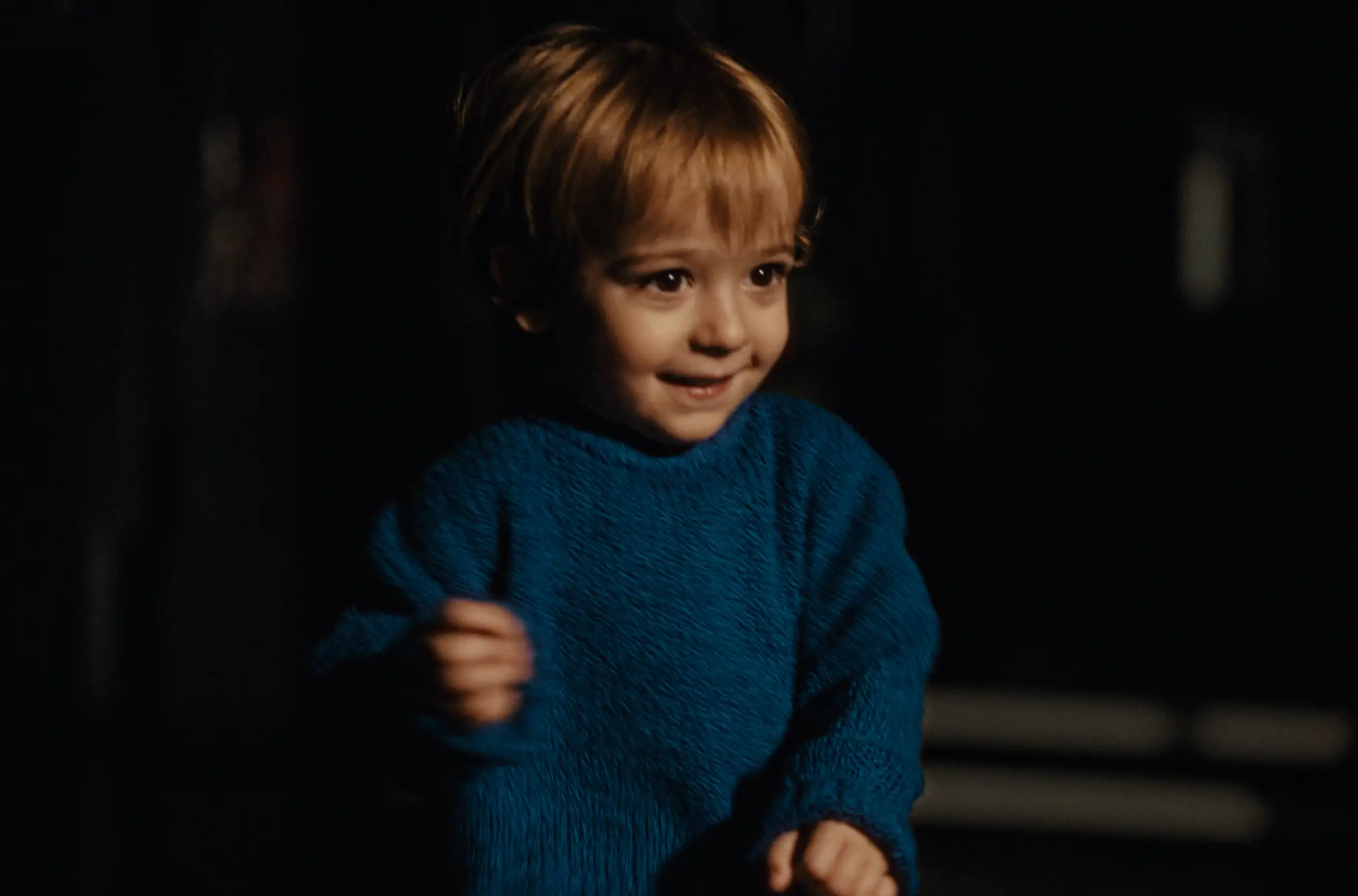 His son then features as a toddler (John Lewis)