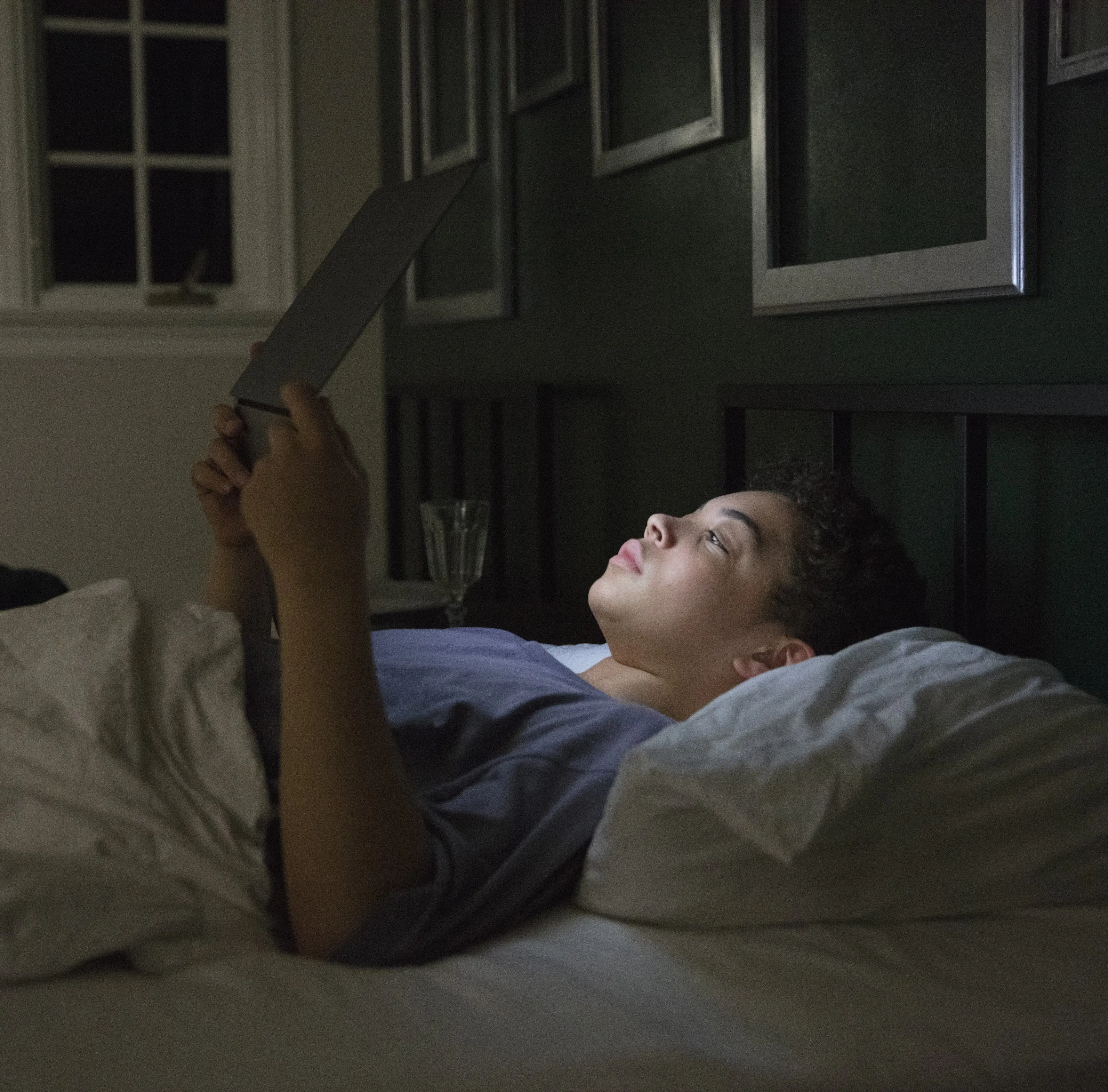 Electronics could stop you from snoozing all night. (Filmstax/Getty images)