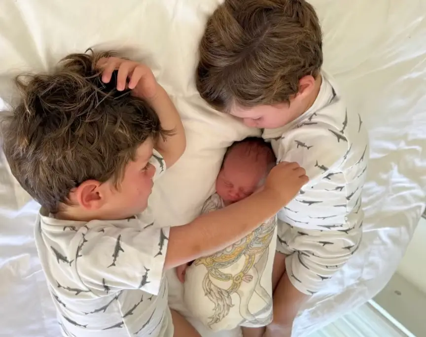 Eugenie included heartwarming snaps of August and Ernest being protective big brothers (Instagram/@princesseugenie)