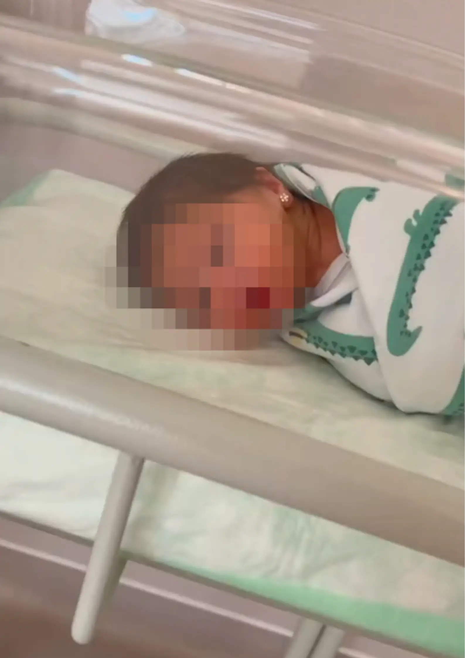 This mum pierced her daughter's ears just hours after she was born.