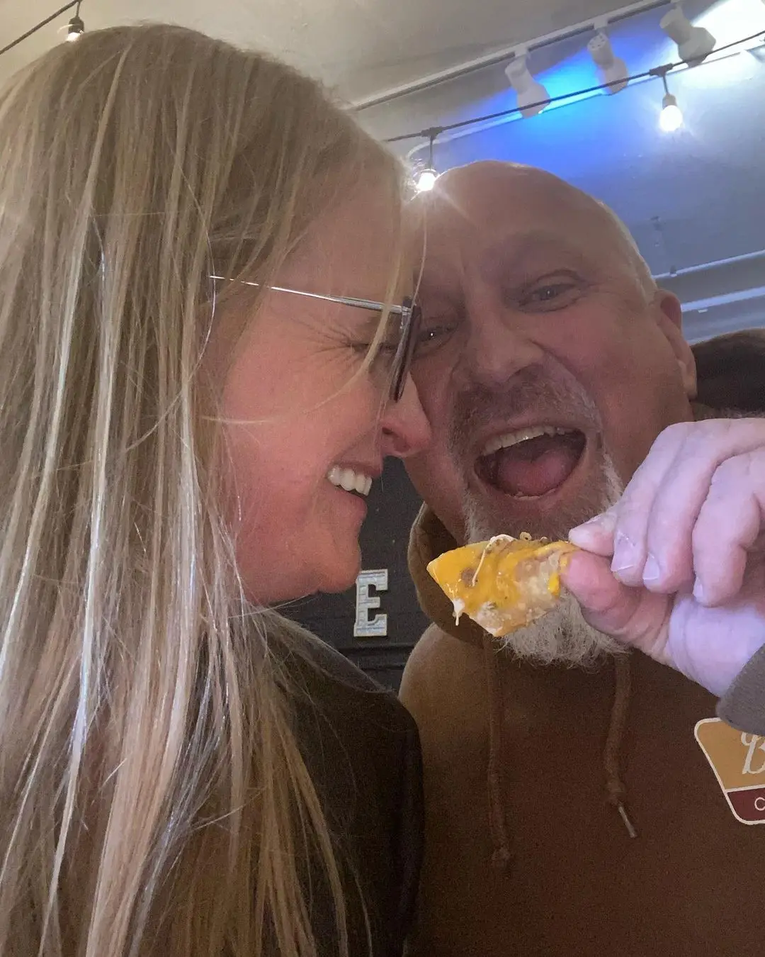 David clearly loved feeding his fiancée nachos.