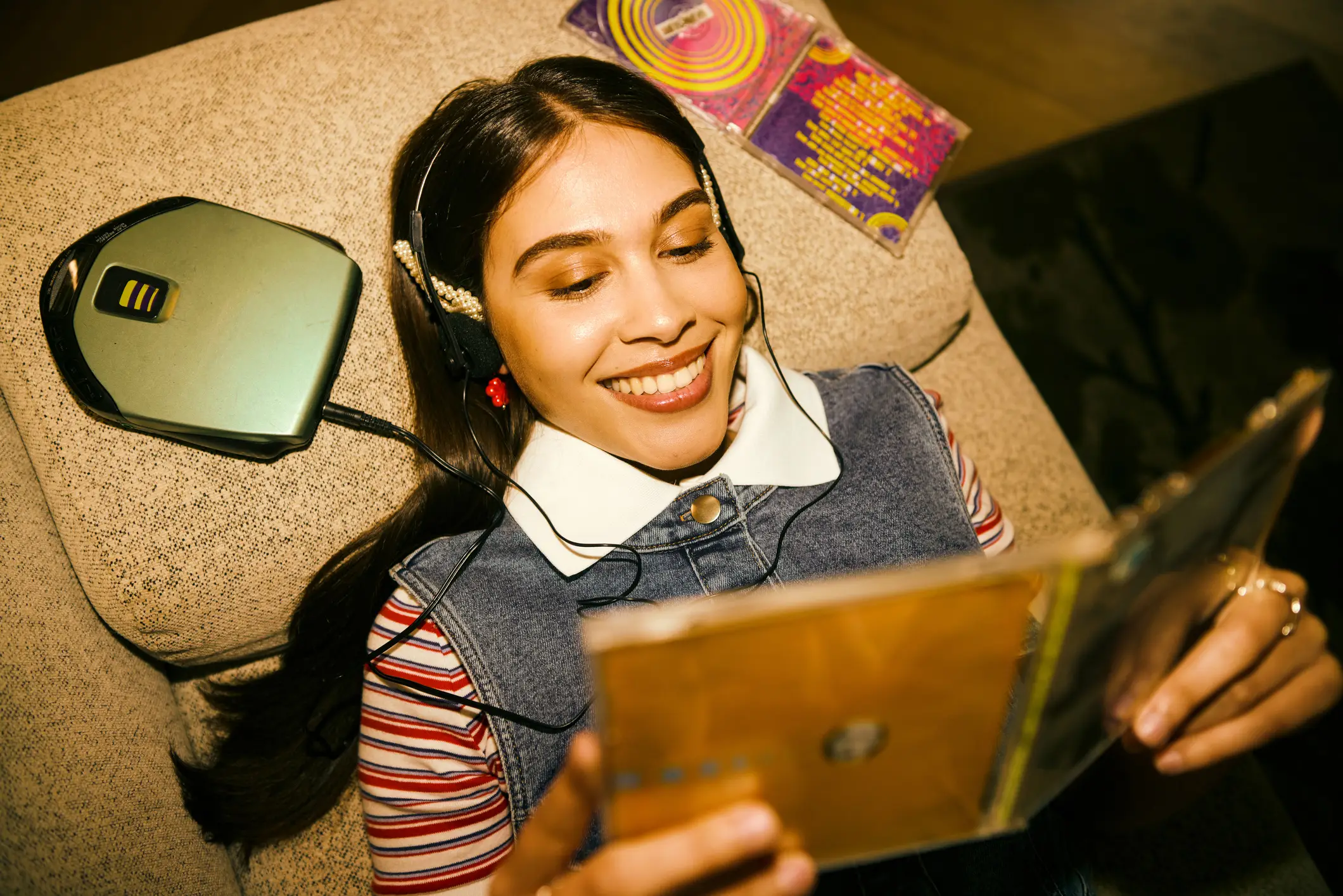 'Childhoodmaxxers' may also seek comfort in listening to music from childhood (Getty Stock Images)
