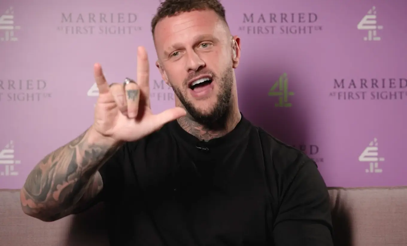 Ross demonstrated one of Bleu's favourite signs (RNID)