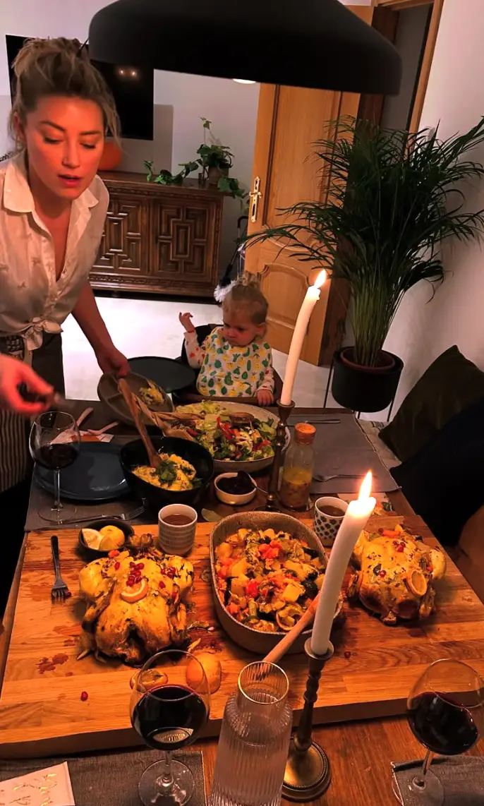 She also shared a picture of a child that is presumed to be her eldest daughter, Oonagh (Instagram/@amberheard)