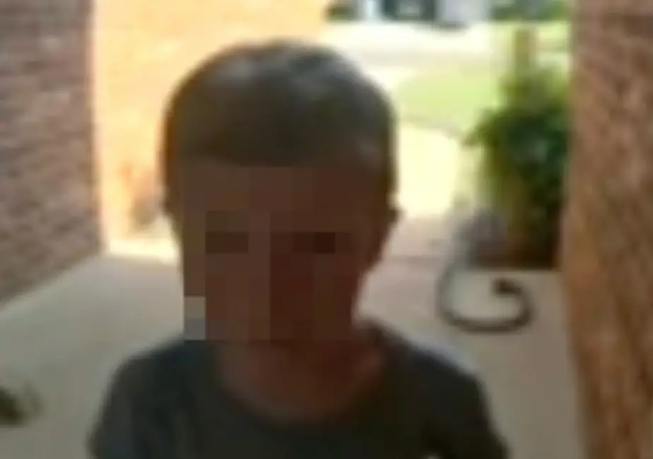 The young boy went to a house to ask for help.