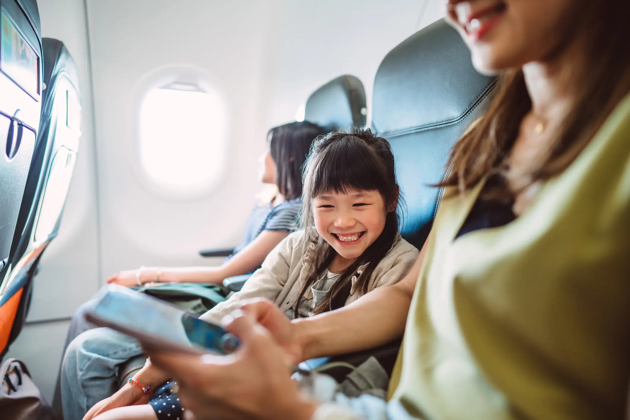 Parents flying with young children will now be able to avoid the £8 fee (Getty Stock Image)