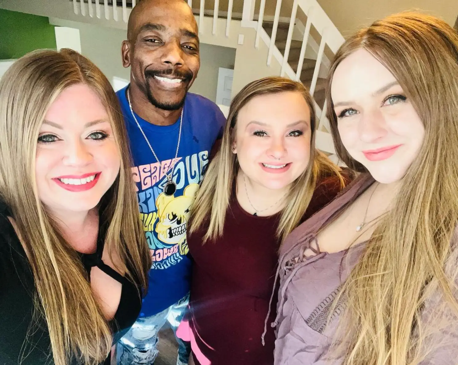 Nick Davis has three wives.