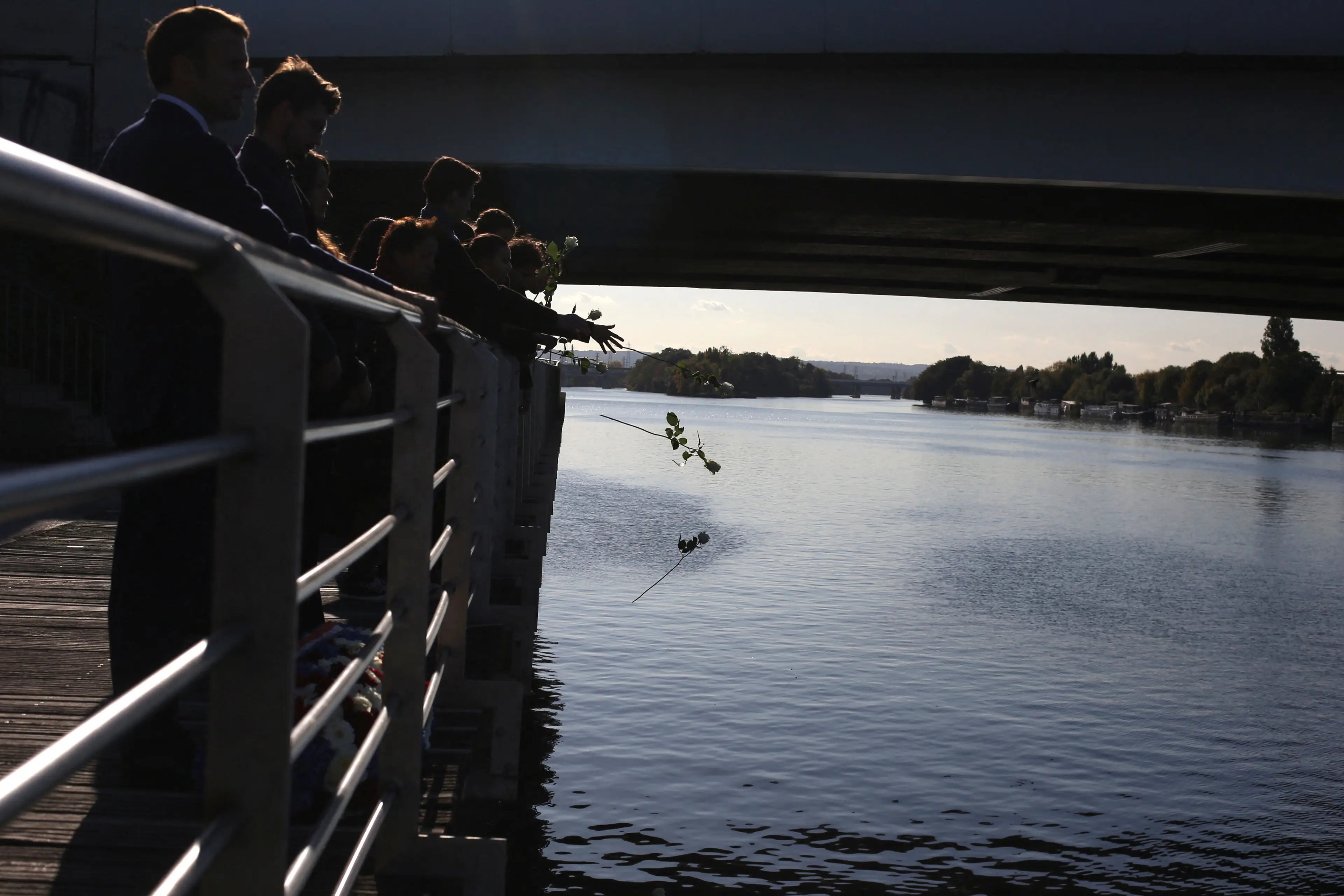 The Algerian team threw roses into the Seine (RAFAEL YAGHOBZADEH/POOL/AFP via Getty Images)