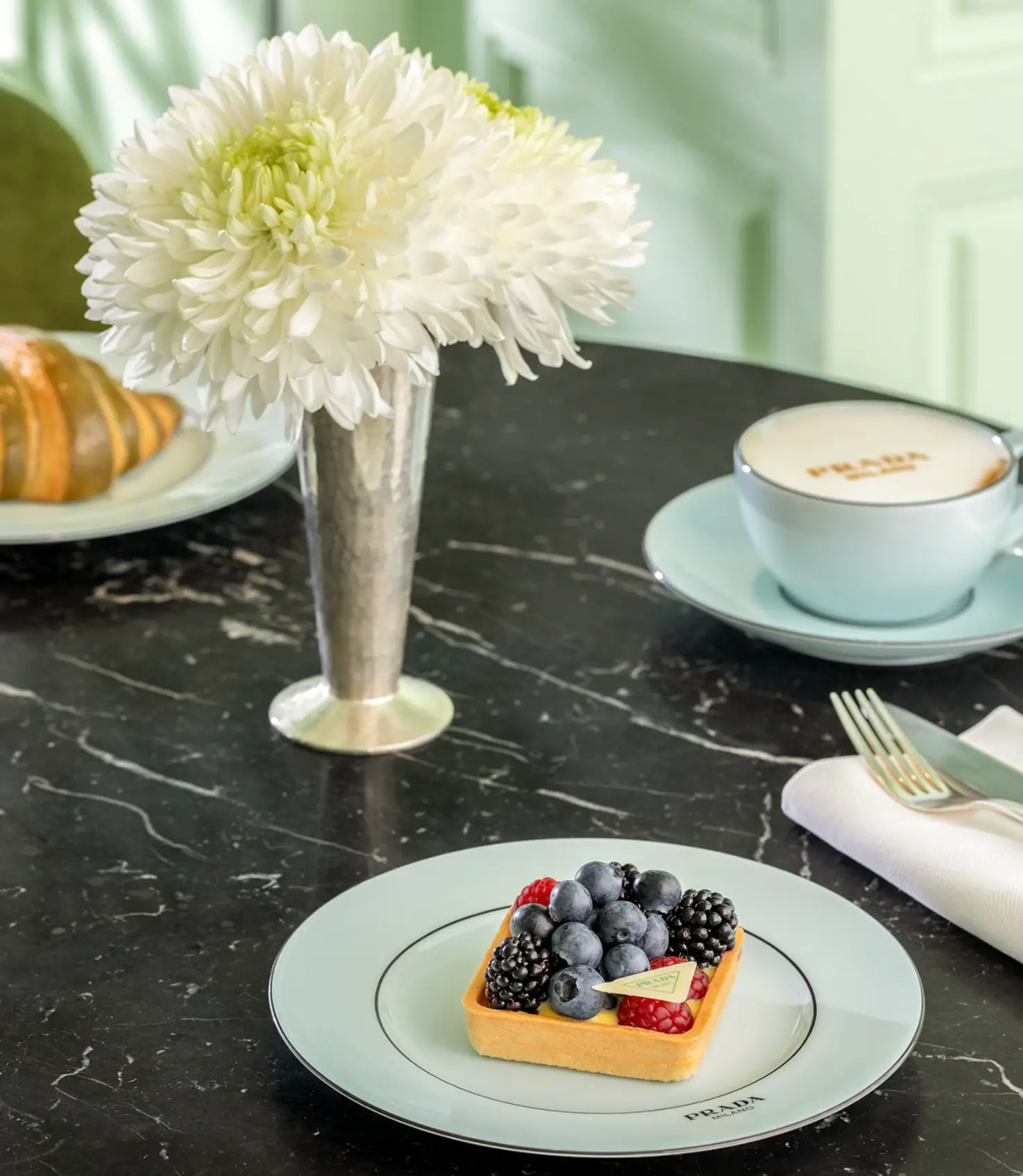 Luxury fashion houses have opened up food spots around the globe (Prada)