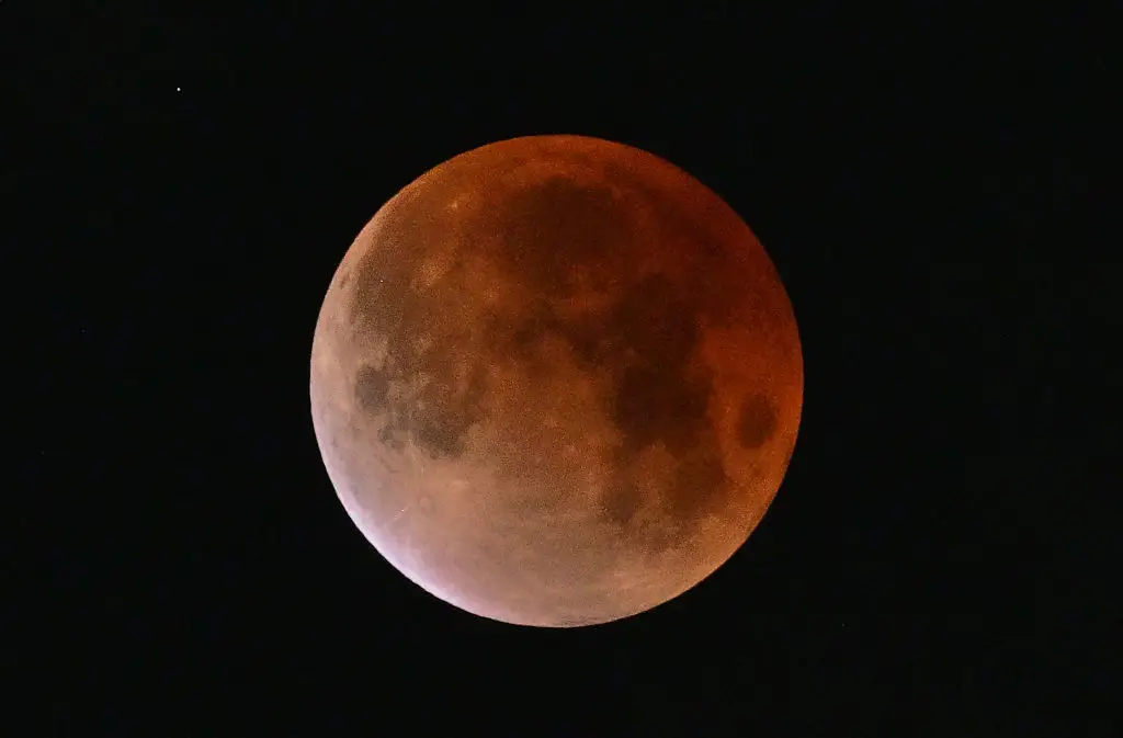 It's the total lunar eclipse and blood moon tonight (FREDERIC J. BROWN / Contributor / Getty Images)