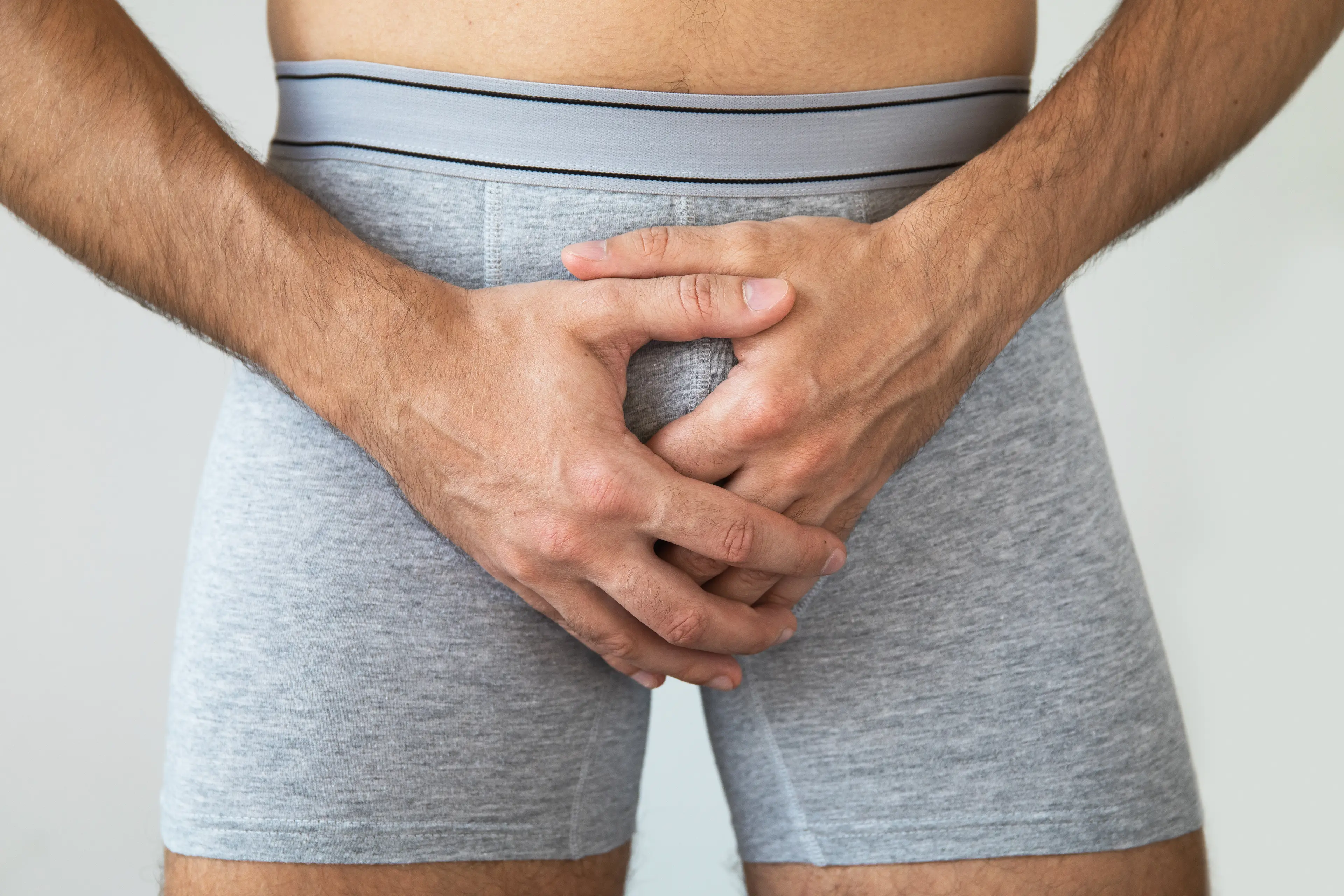 A doctor has issued a warning over 'penis-maxxing' trends like 'scrotox' (Getty Stock Images)
