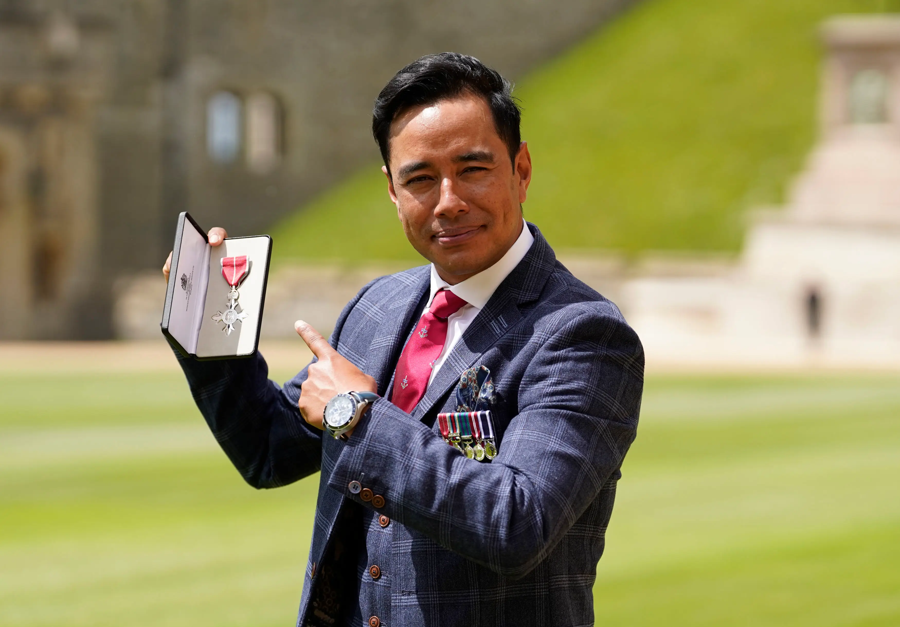 Nirmal Purja was awarded an MBE by the late Queen.