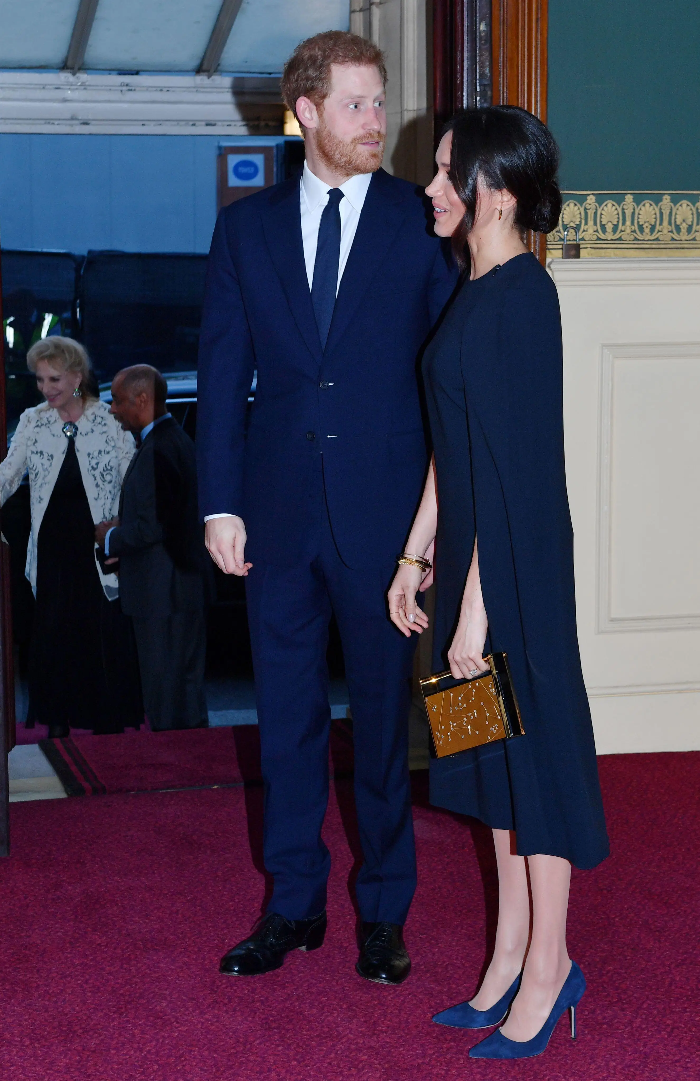 Meghan Markle wore the same style dress to the Queen's birthday honours in 2018.