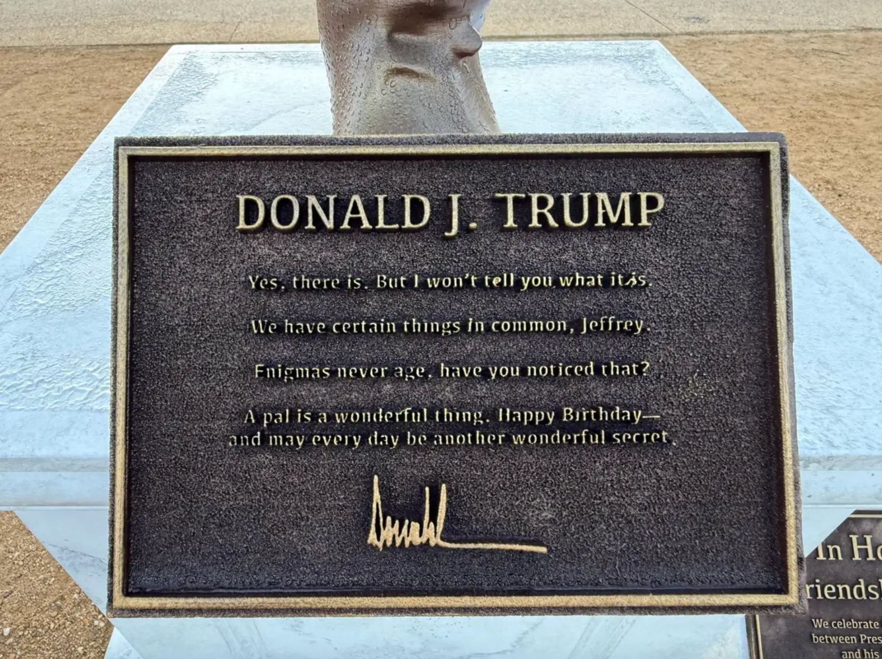 One plaque below the statue contained excerpts from the birthday letter Trump allegedly wrote to Epstein for his 50th birthday (The Secret Handshake)