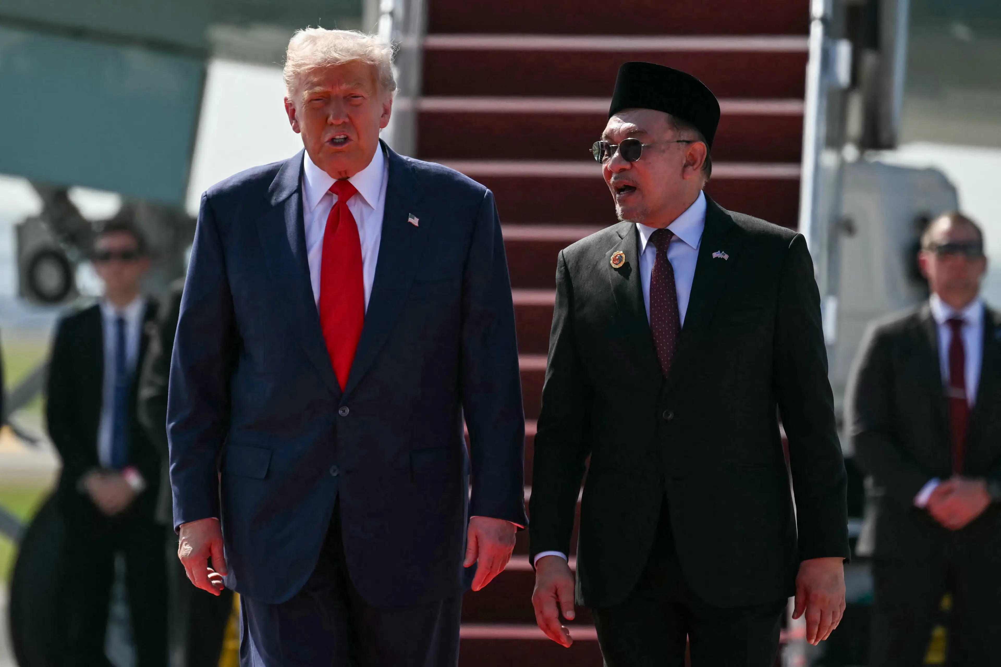 Trump touched down in Malaysia on Sunday (ANDREW CABALLERO-REYNOLDS/AFP via Getty Images)