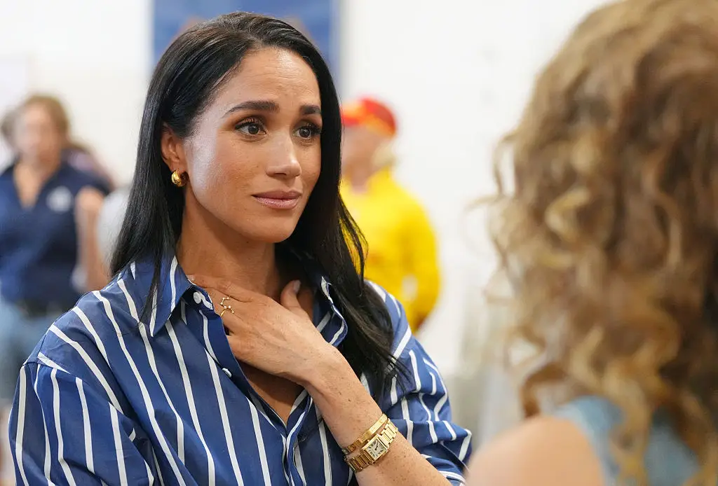 Meghan has been defended after trolls strangely took issue with her son wearing an England shirt rather than a USA kit (Pool/Getty Images)