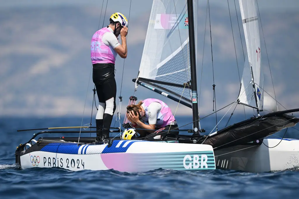 Team GB's Anna Burnet and John Gimson were disqualified from the mixed multihull sailing race before it even started. (Clive Mason / Staff / Getty Images)