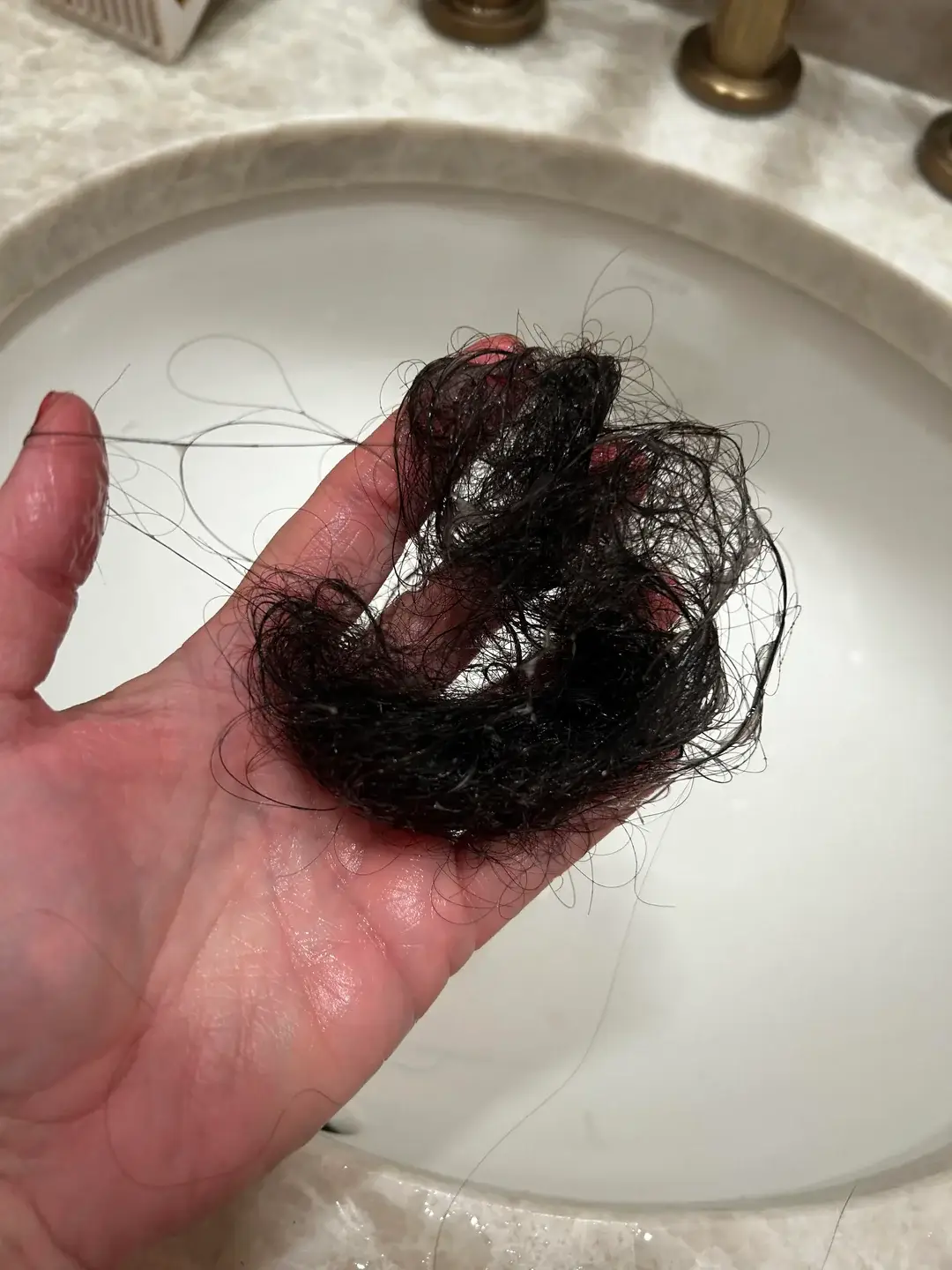 A Reddit user claimed this much hair had come off with a single brush (Reddit)