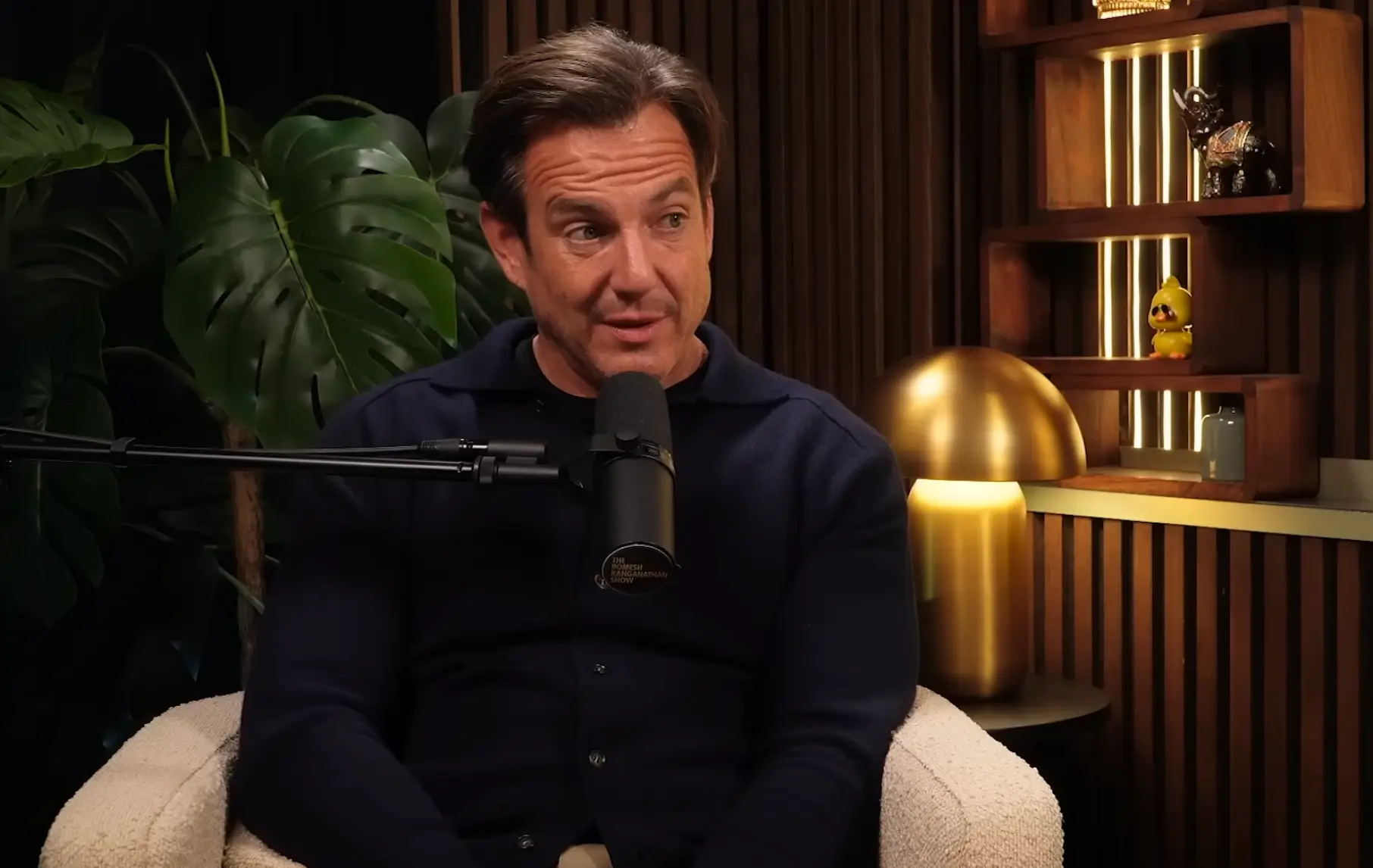 Arnett told Ranganathan he'd be 'blown away' by the identity of the first 'a**hole' (YouTube/The Romesh Ranganathan Show)