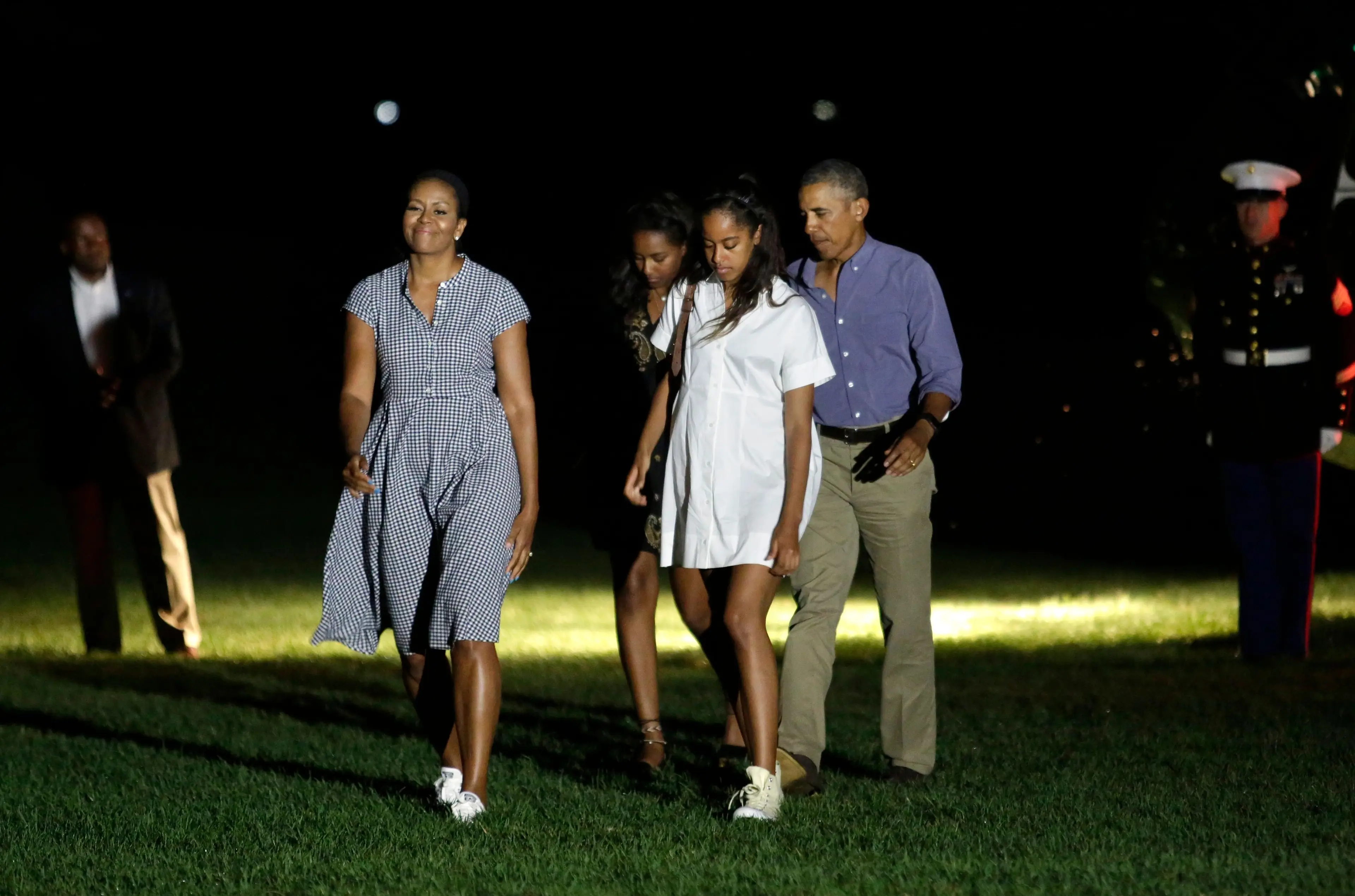 The former FLOTUS details how difficult it was to let Malia and Sasha be normal teens (YURI GRIPAS/AFP via Getty Images)