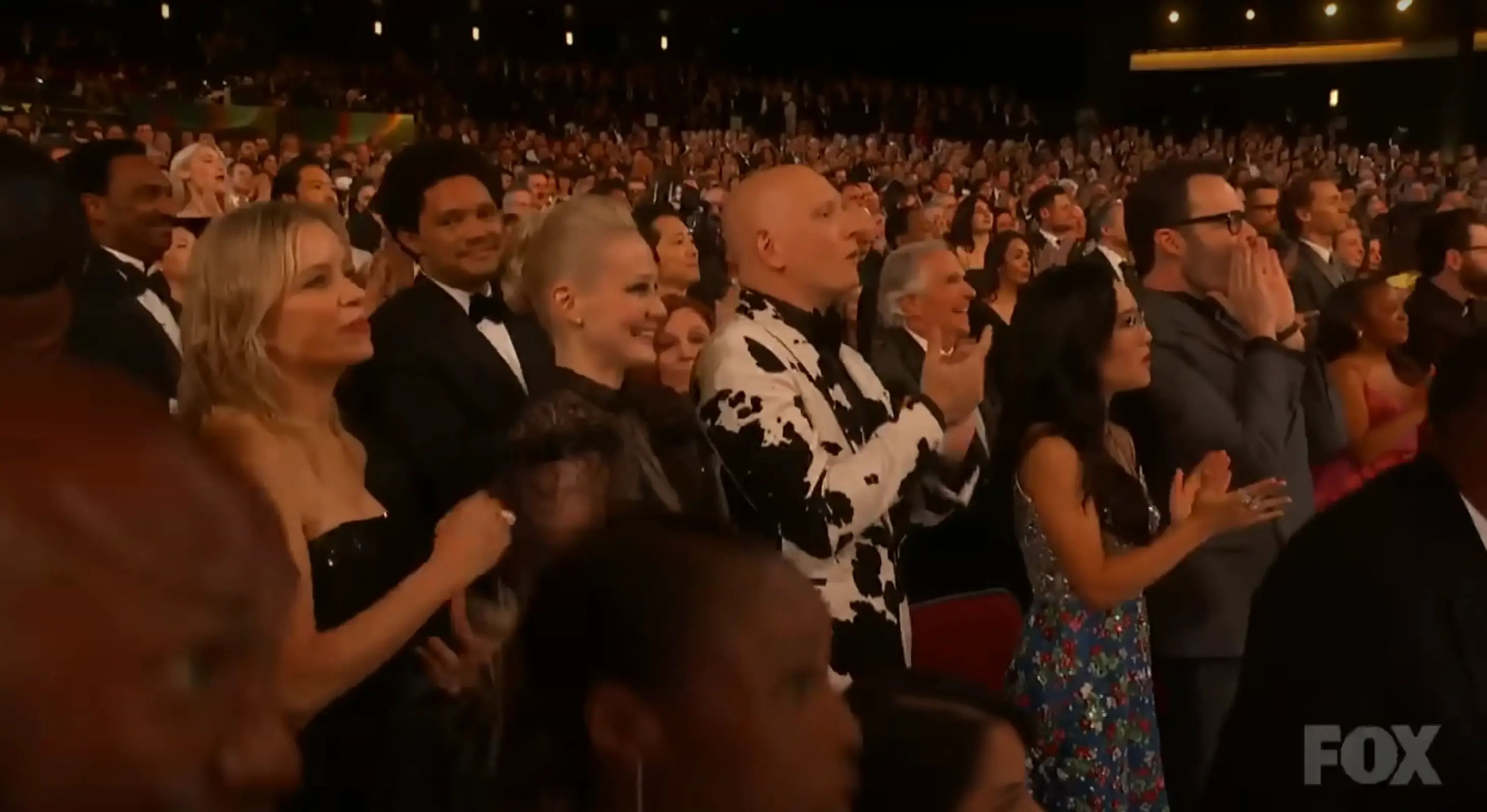 Members of the audience quickly rose to their feet.